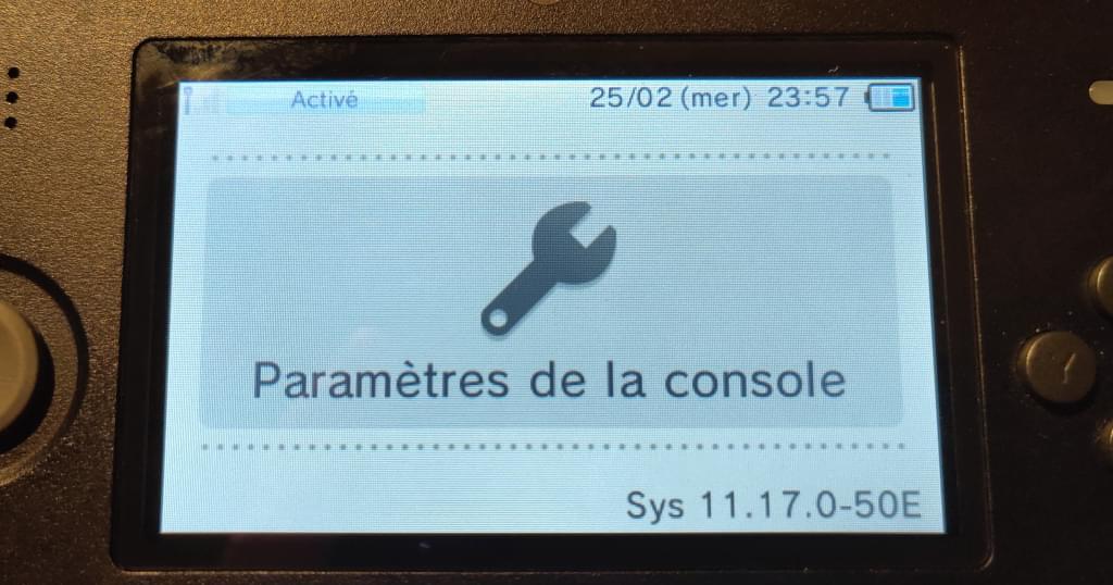 The system settings screen of the 2DS in French, showing firmware version Sys 11.17.0-50E